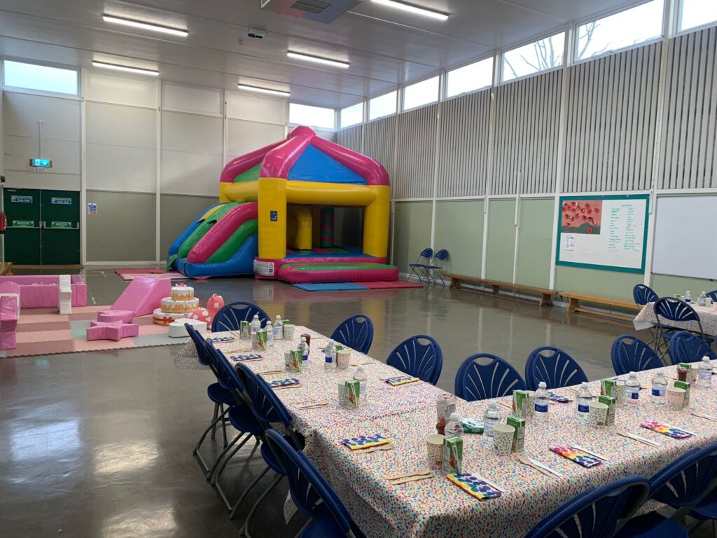 The Sports Hall, set out for a children's party with an inflatable castle